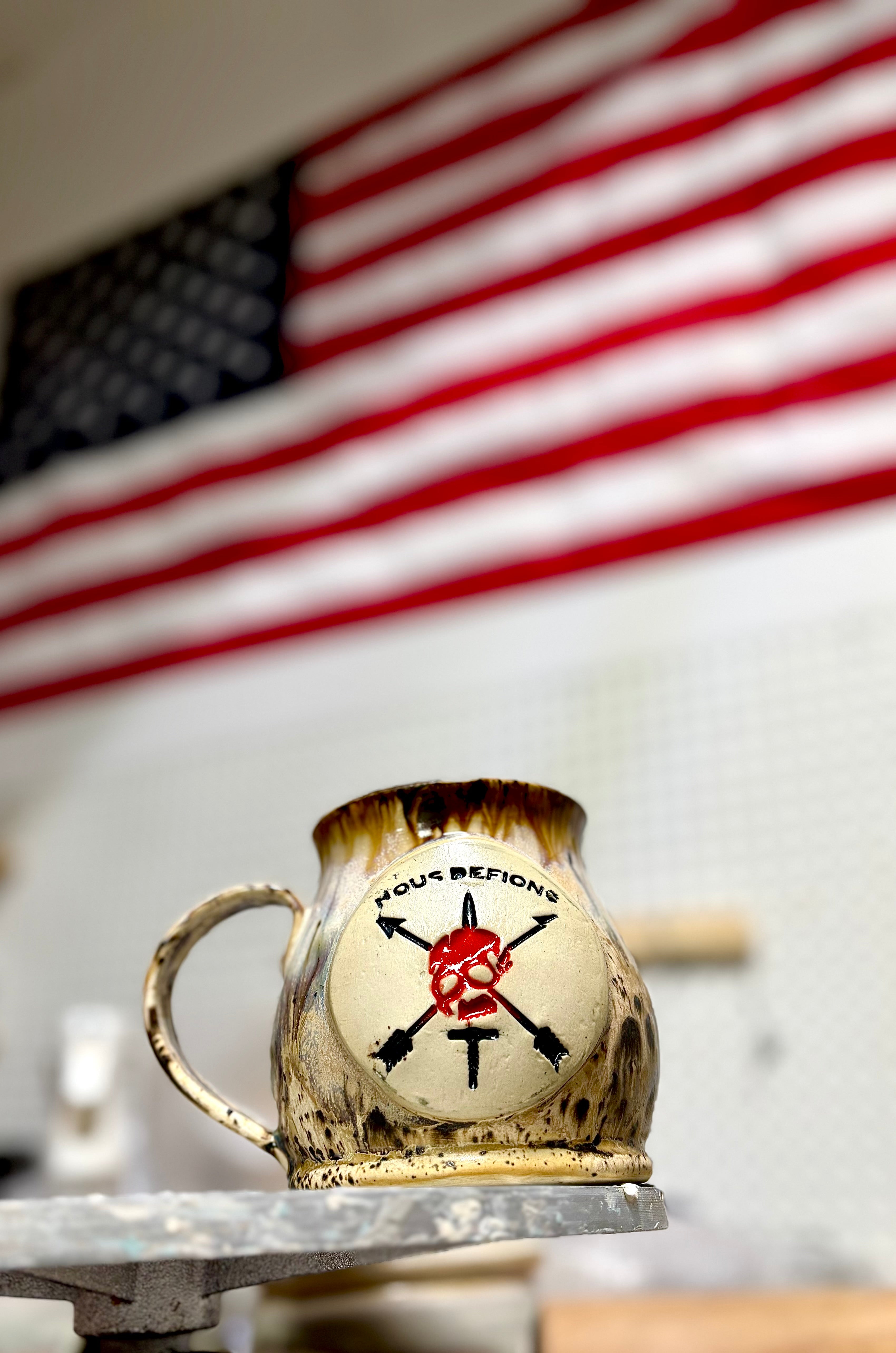 Nous Defions Mug - Red