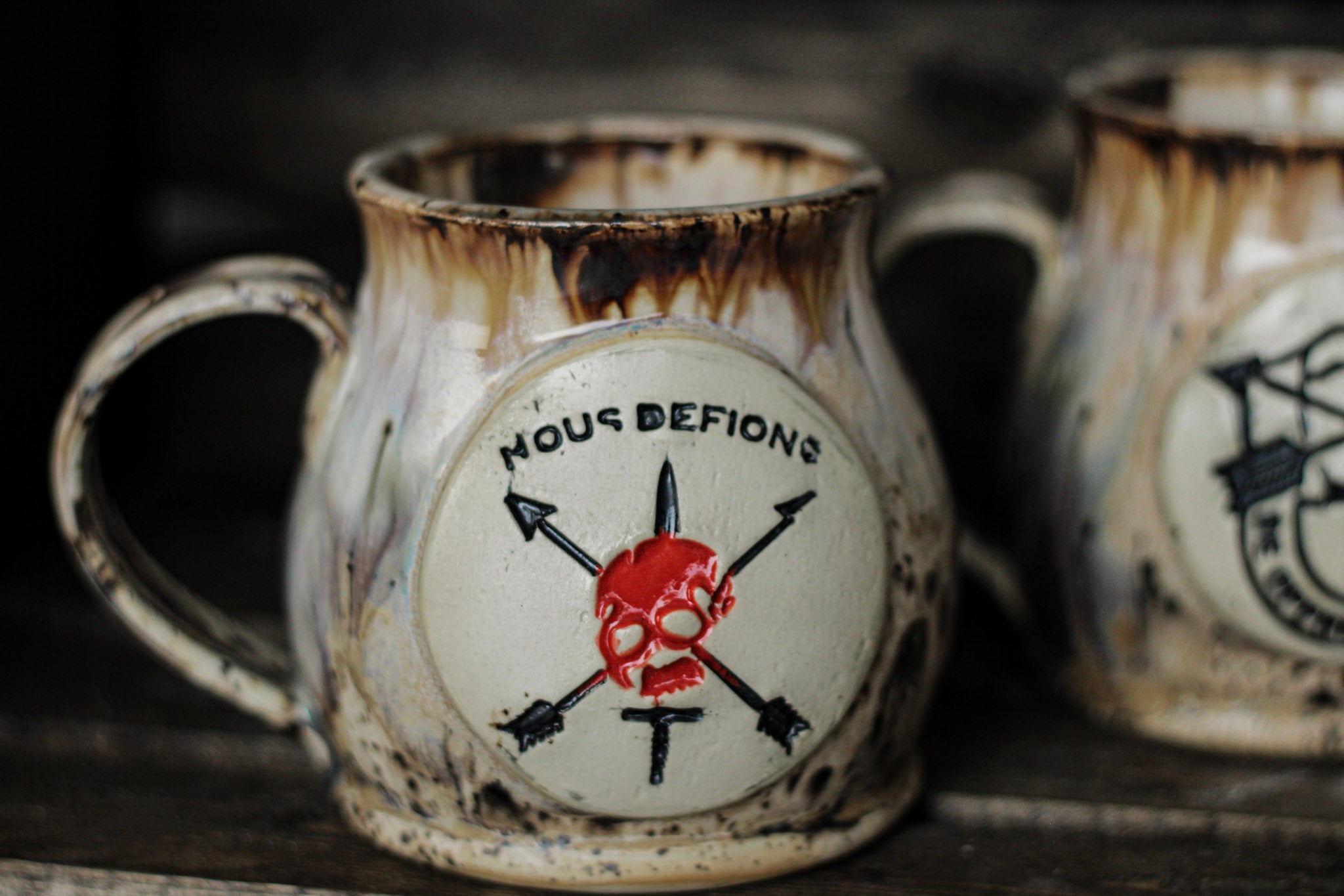 Nous Defions Mug - Red